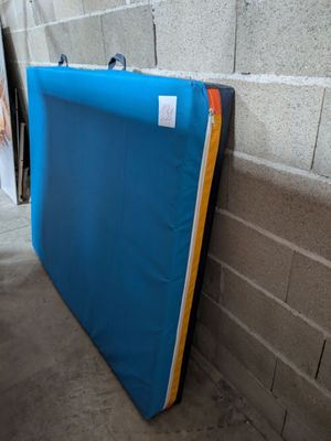 an image of a mattress leaning against a wall