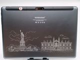 a laptop with a drawing of a statue on the screen
