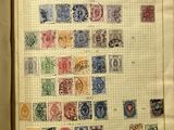 an open book with a lot of different stamps on it
