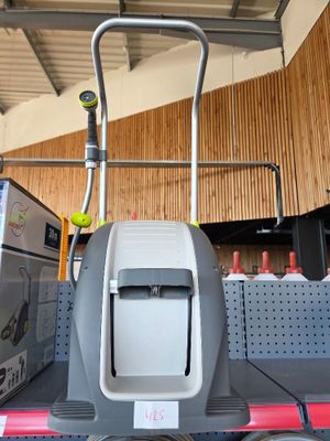 a machine that is sitting on a cart in a store