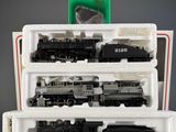 a train set in a box on a table