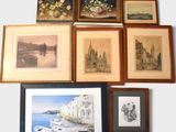 many framed pictures on the wall of a room