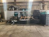 a picture of a machine that is working on a piece of wood