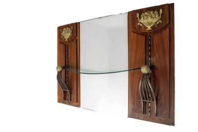 a mirror on the wall with a glass shelf underneath it
