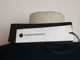 the back of a black shirt with a name tag attached to it