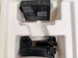 a white box with a black latch and a white box with a black latch