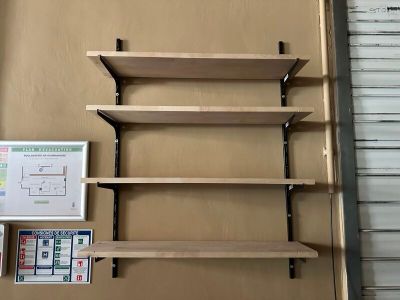 a picture of a shelf that has some books on it