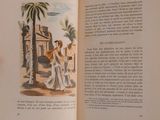 an open book with a picture of a woman and a man on it