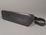 wallet case with strap on a grey background
