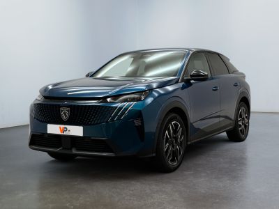a blue toyota c - hr suv parked in a white room