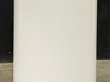 a white air conditioner sitting on the floor