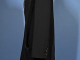 an image of a black suit on a mannequin stand