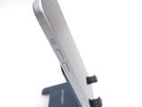a close up of a cell phone on a stand