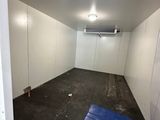 an image of a room with a blue box in it