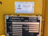 a close up of a sign on the side of a yellow machine
