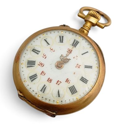 une montre de poche en or avec des chiffres romains