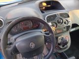 dashboard of a small car with a steering wheel and dashboard controls
