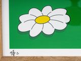 a picture of a picture of a flower on a green background