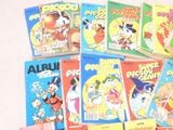 a lot of children ' s books that are on the table