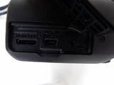 a close up of a computer mouse on a white surface