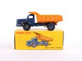 a toy truck that is sitting on top of a box