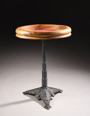 a small wooden table with a metal base and a wooden top