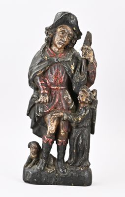 statue représentant un garçon avec un chien et un oiseau