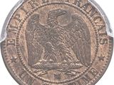 a close up of a coin with an eagle on it