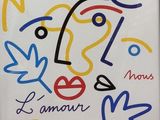 painting of a woman ' s face with the words la mano and the words la mano