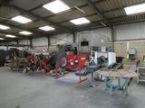 many machines that are sitting in a building