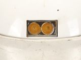 two donuts that are sitting in a white bowl