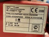 a close up of a label on a red machine