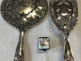 pair of antique silver plated hand mirrors with floral design