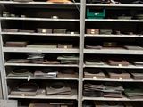 a lot of shelves that have various items on them