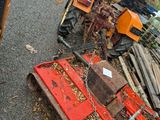 a pile of junk on the side of the road