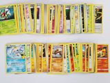 a lot of pokemon cards on the table together