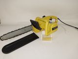 a yellow chainsaw sitting on top of a white table