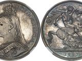 an image of a silver coin with an image of a woman on a horse