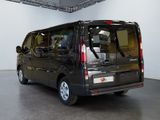 a black van that is parked inside of a building