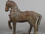 statue of a horse with a saddle on its back