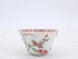 an image of a small bowl with flowers and birds on it