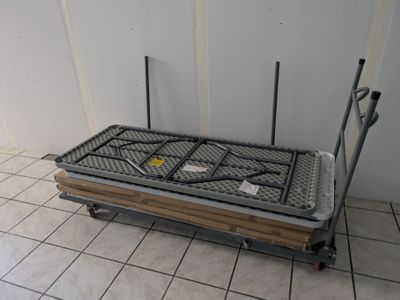 a dolly that is sitting on a tile floor