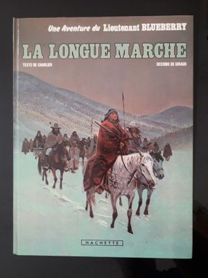 une image d'un livre avec une image d'un homme sur un cheval