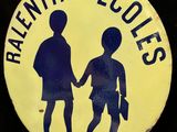 an image of a button with a picture of a boy and a girl holding hands