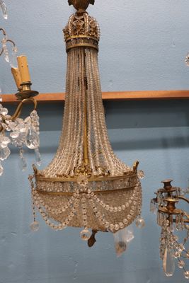 a chandelier hanging from the ceiling in a room