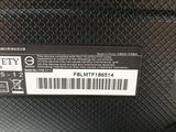 a close up of the back of a black speaker