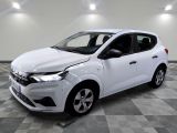 the white car is parked on a checkered floor in a room
