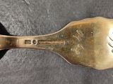 a spoon that is sitting on a table