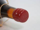 a bottle of wine that is sitting on a table
