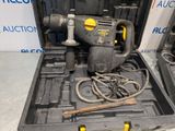 a tool in a case with a hammer and other tools in it